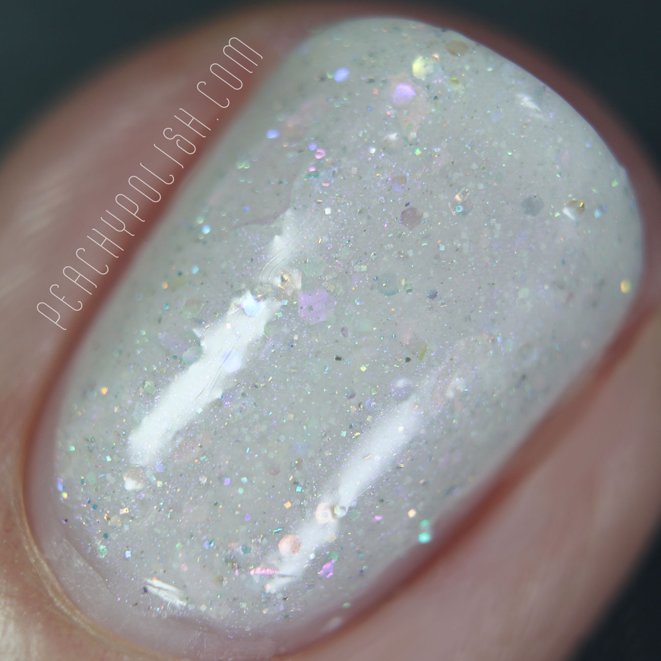 Femme Fatale Cosmetics The White Flame | Opalescent Collection | Peachy Polish